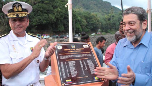 Prime Minister of SVG Ralph Gonsalves, right, and Major Manuel Querembas of the Ecuadorian Army applaud after unveiling a plaque at Hope Bridge. (Photo: Zavique Morris-Chance/IWN)