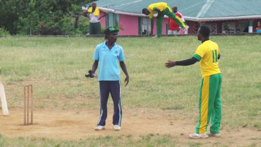 Umpire and player in heated discussion.