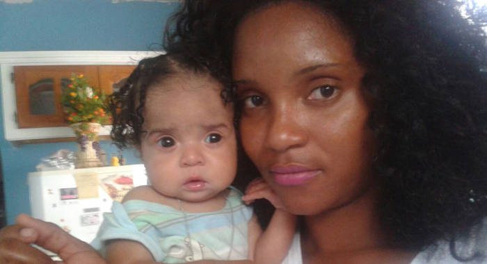 Juanita Harry and her child, Kadrian John, who died at Milton Cato Memorial Hospital on June 5.