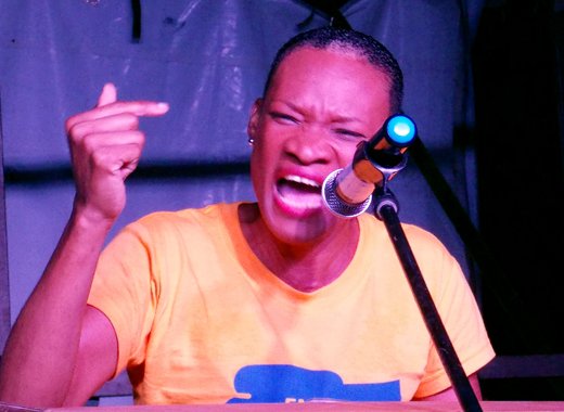 Radio announcer Laverne Phillips addressing the NDP's rally in Richland Park Sunday night.