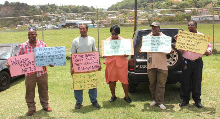 Members of the Public Service Union protest outside the Sports Council Office on Tuesday. (IWN photo)