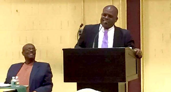 MP for North Leeward Roland "Patel" Matthews addresses the town hall meeting in New York as party Leader Arnhim Eustace looks on. (Photo: Facebook)