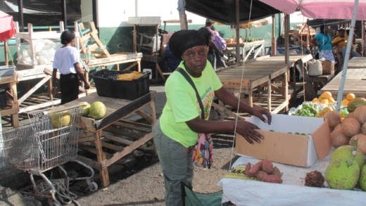 Vendor Venice George paid to have a new table built after hers was destroyed by Town Board staff. (IWN photo)