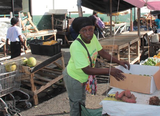 Vendor Venice George paid to have a new table built after hers was destroyed by Town Board staff. (IWN photo)