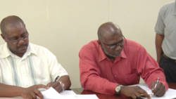 Minister of National Mobilisation Frederick Stephenson, left, and Permanent Secretary in the Ministry of Agriculture, Raymond Ryan.