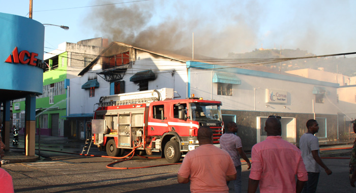 Firefighters respond to the blaze in Kingstown on Sunday. (Photo: Karamo John/IWN)