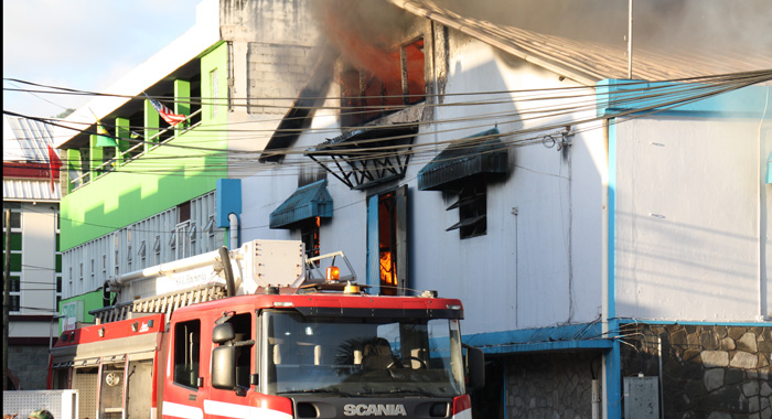 Firefighters respond to the blaze in Kingstown on Sunday. (Photo: Karamo John/IWN)