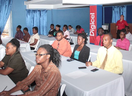 Job applicants prepare to take examinations for a chance to work at the Digicel call centre. (IWN Photo)