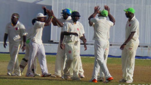 Dominica celebrate their victory on Wednesday. (Photo: E. Glenford Prescott)