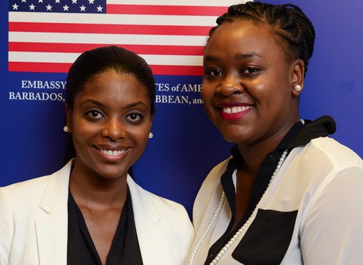 Vincentian Kimberley Cambridge, right, and Barbadian Charlene James will be traveling to the United States as Fulbright Foreign Students.