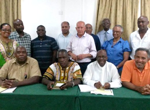 NDP leadership and executive members pose along with the visiting Garifunas after a closed-door meeting last week Friday. (Photo: NDP/Facebook)