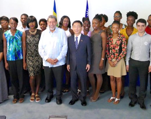 The scholarship recipients pose with Prime Minister Ralph Gonsalves, Ambassador Baushuan Ger, and Minister of Education Girlyn Miguel. (Photo: Jamali Jack).
