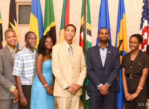The 2015 Eastern Caribbean Youth Ambassadors (from left) Rol-J Williams, Kamalie Mannix, Alron Harry, Tessa Moncherie, Matthew McLawrence, Timothy Ferdinand (mentor), and Adiel Charles pose with U.S. Ambassador to Barbados, the Eastern Caribbean, and the OECS, Dr. Larry Palmer.