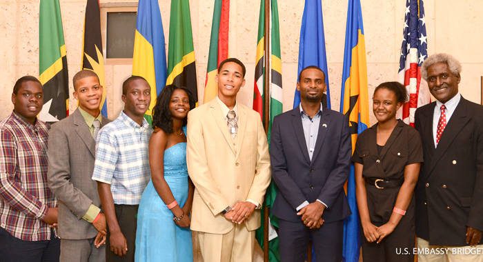 The 2015 Eastern Caribbean Youth Ambassadors (from left) Rol-J Williams, Kamalie Mannix, Alron Harry, Tessa Moncherie, Matthew McLawrence, Timothy Ferdinand (mentor), and Adiel Charles pose with U.S. Ambassador to Barbados, the Eastern Caribbean, and the OECS, Dr. Larry Palmer.