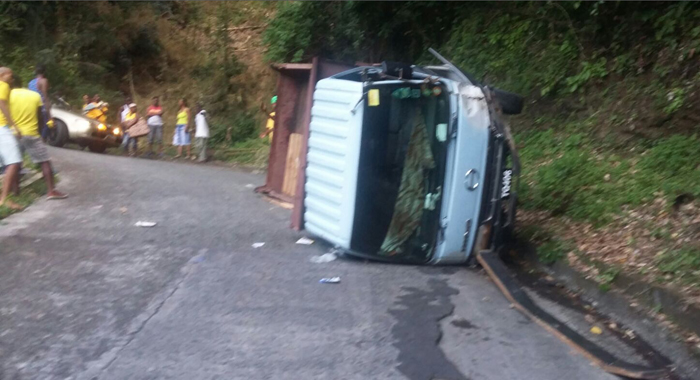 The truck, TQ406, fell on Baptiste's leg when it overturned.