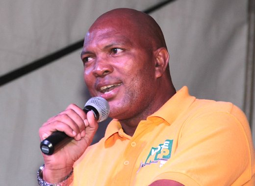 MP for South Leeward addressing the NDP rally in Campden Park. (IWN photo)