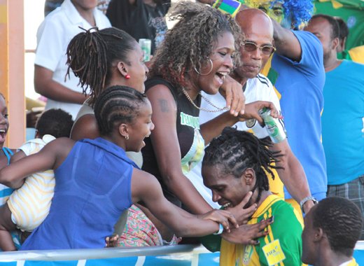 Tevin Slater is celebrated as he scores against Aruba on home soil. He also came through for his team in the away leg. (IWN photo)