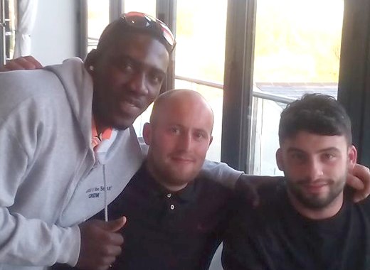 Vincentian allrounder Casmond Walters, left, and teammates in the UK. 
