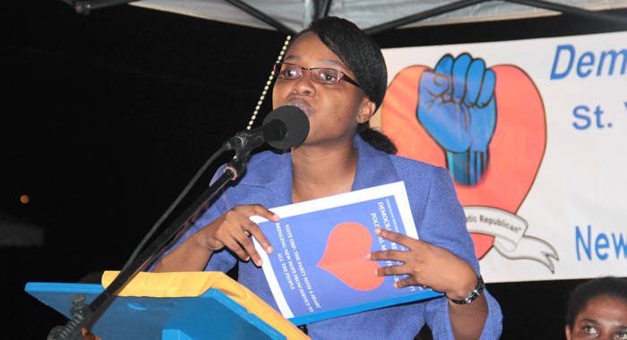 Leader of the DRP, Anesia Baptiste holds a copy of the manifesto at the launch Wednesday night. (IWN   photo)