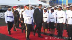 President Maduro inspects a guard of honour at E.T. Joshua Airport on Sunday. (Photo: E. Glenford Prescott/IWN)