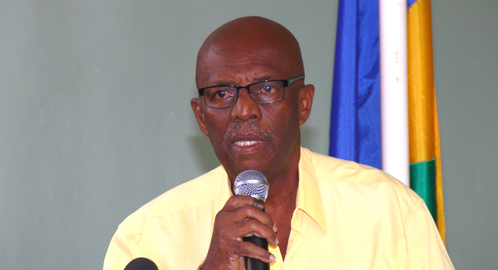 President of the NDP, Arnhim Eustace addresses party supporters and the media on Saturday. (IWN photo)