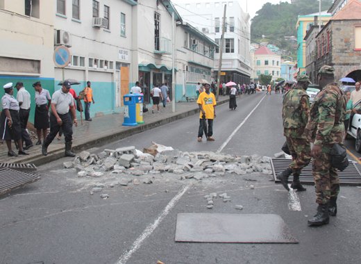 Opposition supporters dumped debris in the street as part of their protest in Kingstown on Dec. 14, 2015. (IWN photo)