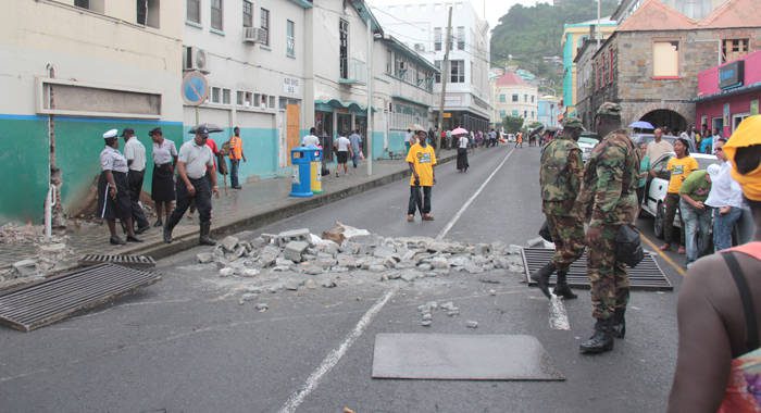 Opposition supporters dumped debris in the street as part of their protest in Kingstown on Dec. 14, 2015. (IWN photo)