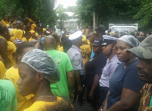 NDP supporters and police outside Government House on Thursday. (Photo: NDP/Faceb0ok)