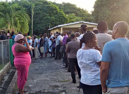 Person wait to vote in Calliaqua. (CMC photo)
