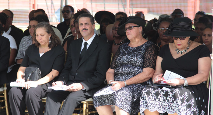 McIntosh's widow, Carmel, second right, and other relatives at the funeral. (IWN photo)