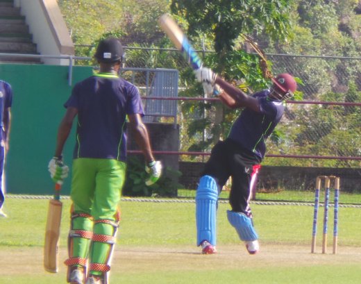 Lime Radcliffe's Delorn Johnson (41) hits out. 