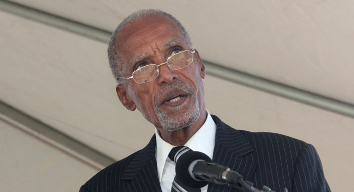 John Horne delivers the eulogy at Father McIntosh's funeral. (IWN photo)