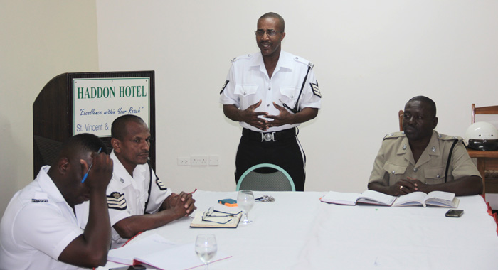 From left: Police officers Constable Bobb, Station Sergeant Junior Nero, Sergeant Henry Providence, and Superintendent Kenneth John at Tuesday's meeting. (IWN photo) 