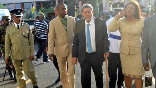 Prime Minister Ralph Gonsalves uses a walking stick on his way to Parliament on Monday. (Photo: Kingsley Roberts/Facebook)
