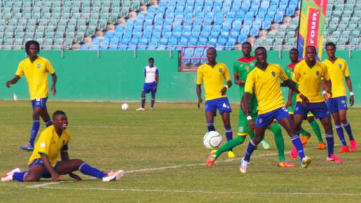Action in the SVG-Guyana match at Arnos Vale on June 10, 2015. (Photo: E. Glenford Prescott)