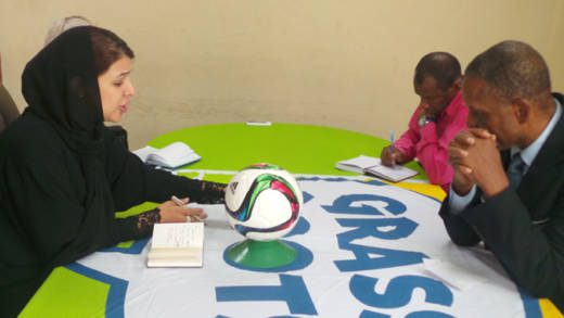 Minister of State in the United Arab Emirates (UAE), Reem Al Hashimy, left,  and president of the SVG Football Federation (SVGFF) Venold Coombs, right.