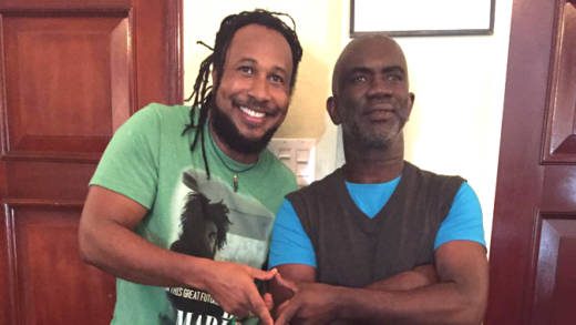 Artiste Aaron Silk with producer Linford Marshall, of Fat Eyes Music Productions, following the launch event.