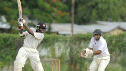 Gidron Pope drives during a local match. (Photo: Brooks LaTouche)