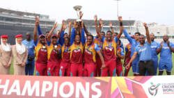 West Indies U19 players celebrate with trophy after their world cup win on the weekend.