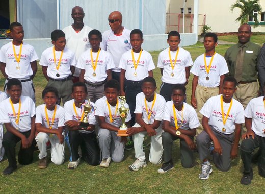 Champions Sandy Bay Secondary School pose with tournament officials and sponsors.