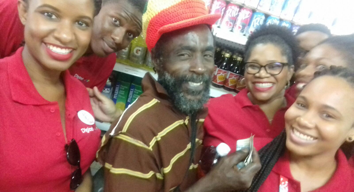 All smiles as customers received instant cash to pay for his groceries.