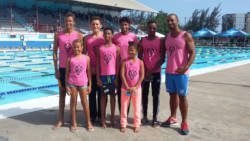 From left: Aaron Defreitas, Mya Defreitas, Cruz Halbich, Alex Joachim, Shné Joachim, Jamie Joachim, Shane Cadogan, Coach Kyle Dougan.