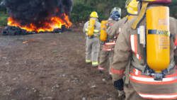 Firefighters engaged in a simulation exercise. 