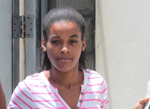 Friekesha Douglas beat her former boss who refused to pay her immediately after firing her.  (IWN photo)