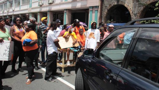 Protesters blocked the road in Kingstown on Friday. (IWN photo)