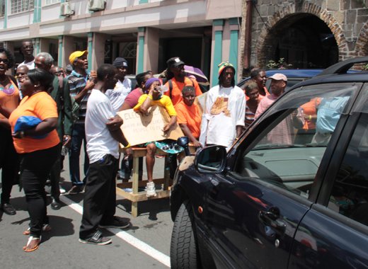 Protesters blocked the road in Kingstown on Friday. (IWN photo)