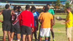 Coach Mike Jackson and members of the SVG Men's Rugby teams.