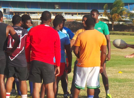 Coach Mike Jackson and members of the SVG Men's Rugby teams.