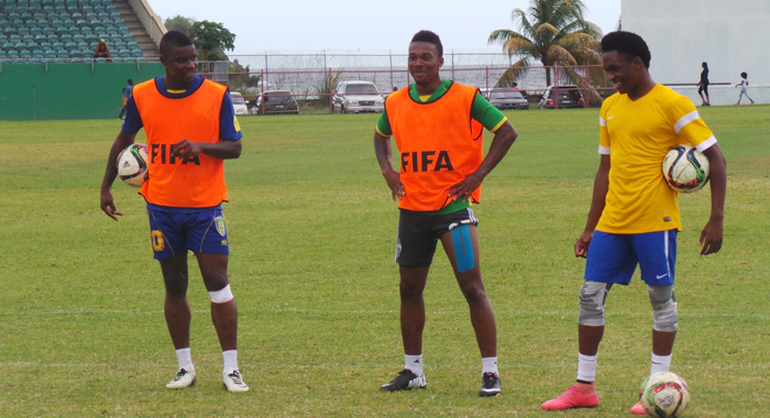 Current SVG players Shandel Samuel, Myron Samuel and Oalex Anderson about to practice spot kicks at training this week.