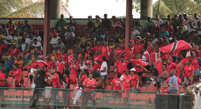 The Trini posse react as thier team equalise. (IWN photo)